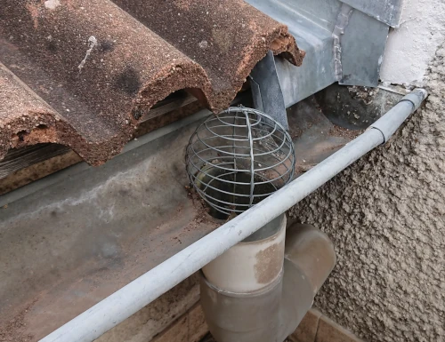 filtre récupération d'eau de pluie crapaudine sur gouttière